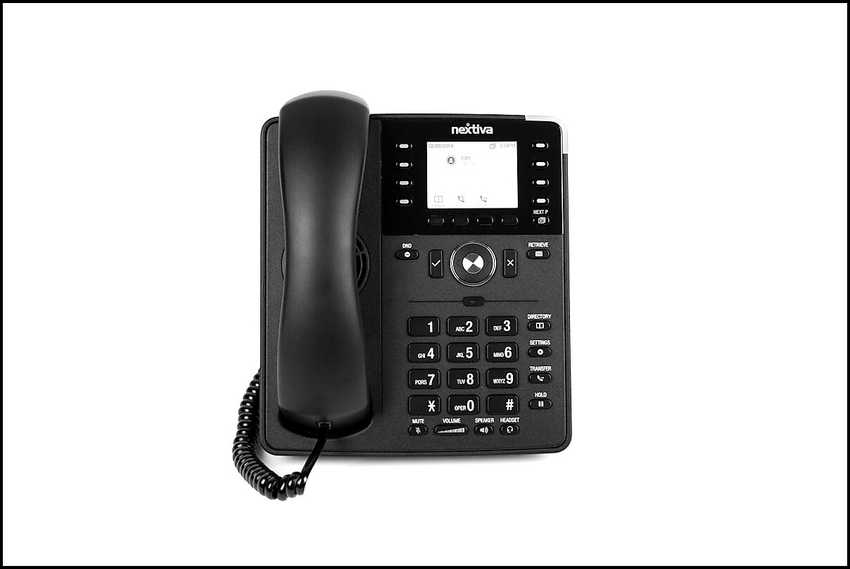 Modern black office desk phone with handset off-hook, numeric keypad clearly visible